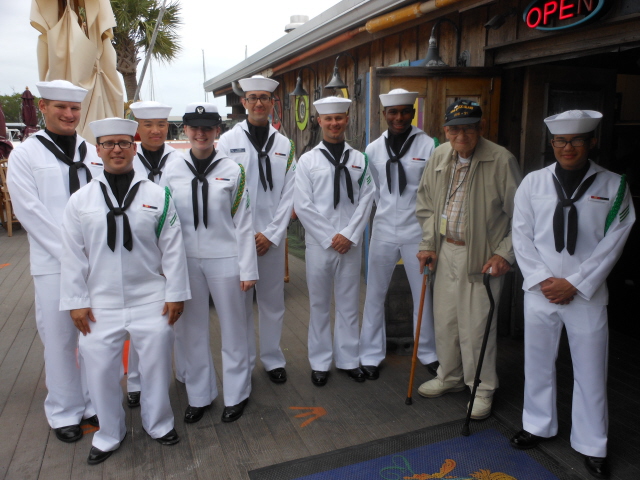 John Struck, a CV-21 survivor, with some members of the NAS Color Guard
