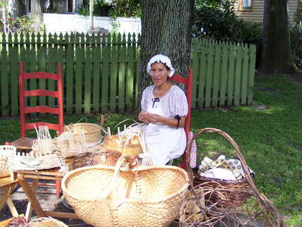 A basket weaver in Historic Pensacola Village